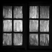 black wooden framed glass window